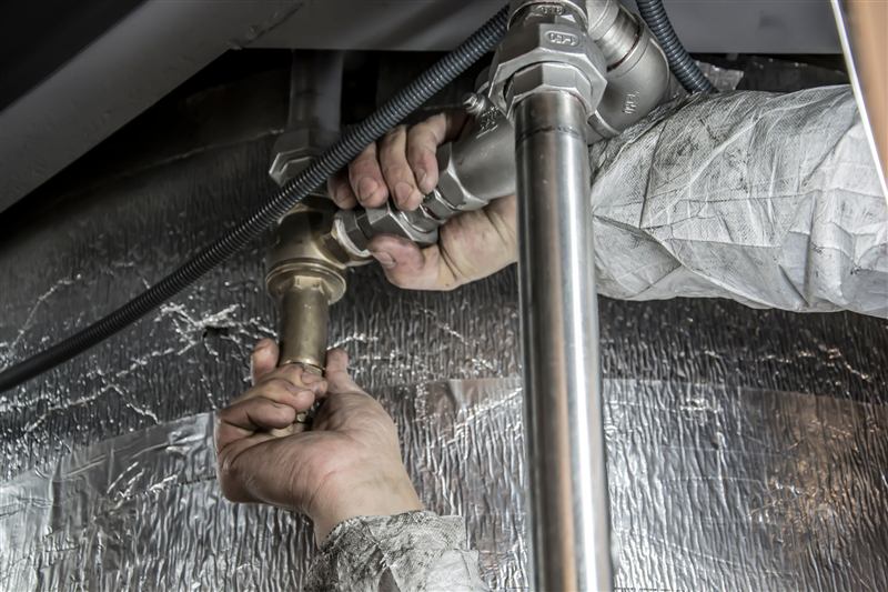 Plumber fitting pipework
